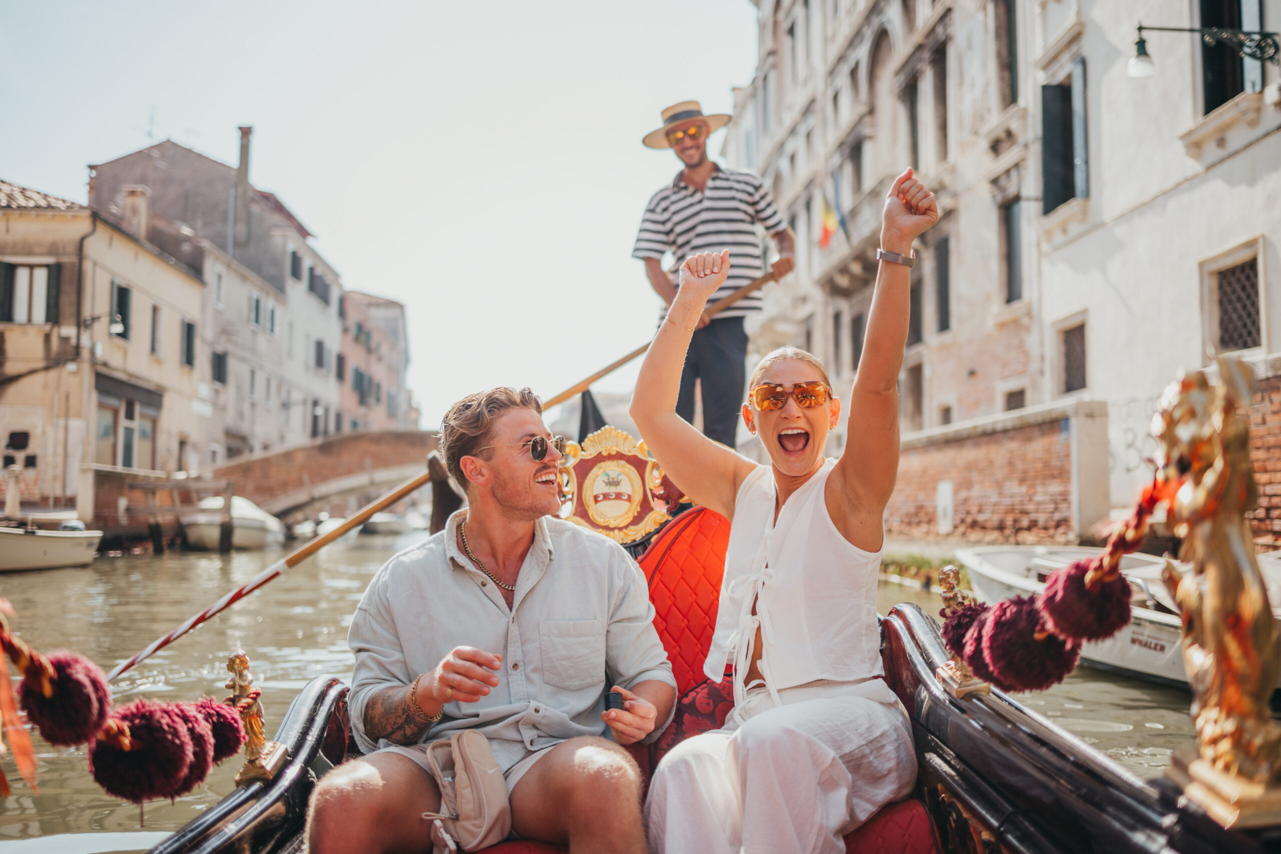 woman has excited reaction to proposal on venice gondola