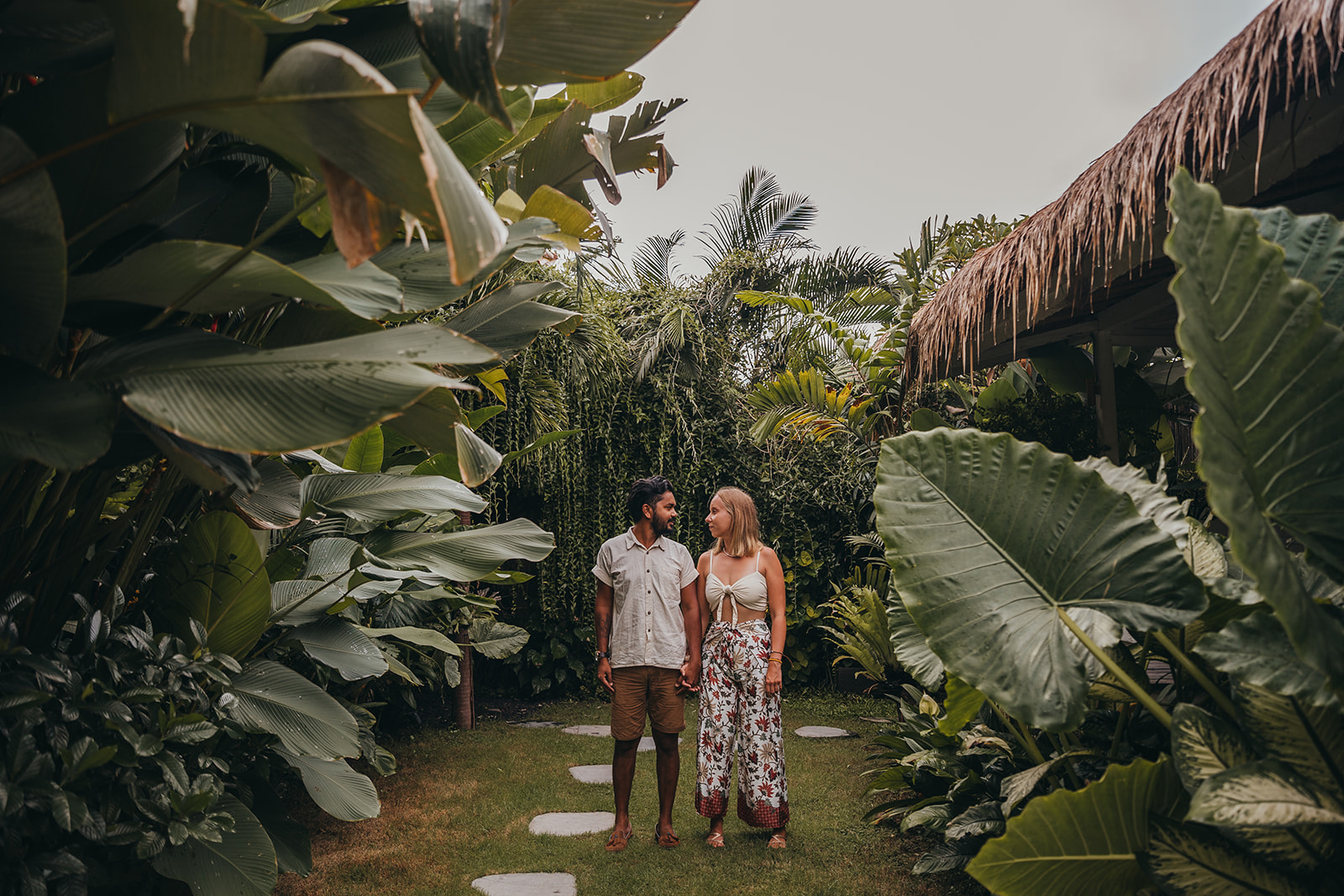 couple in bali holding hands